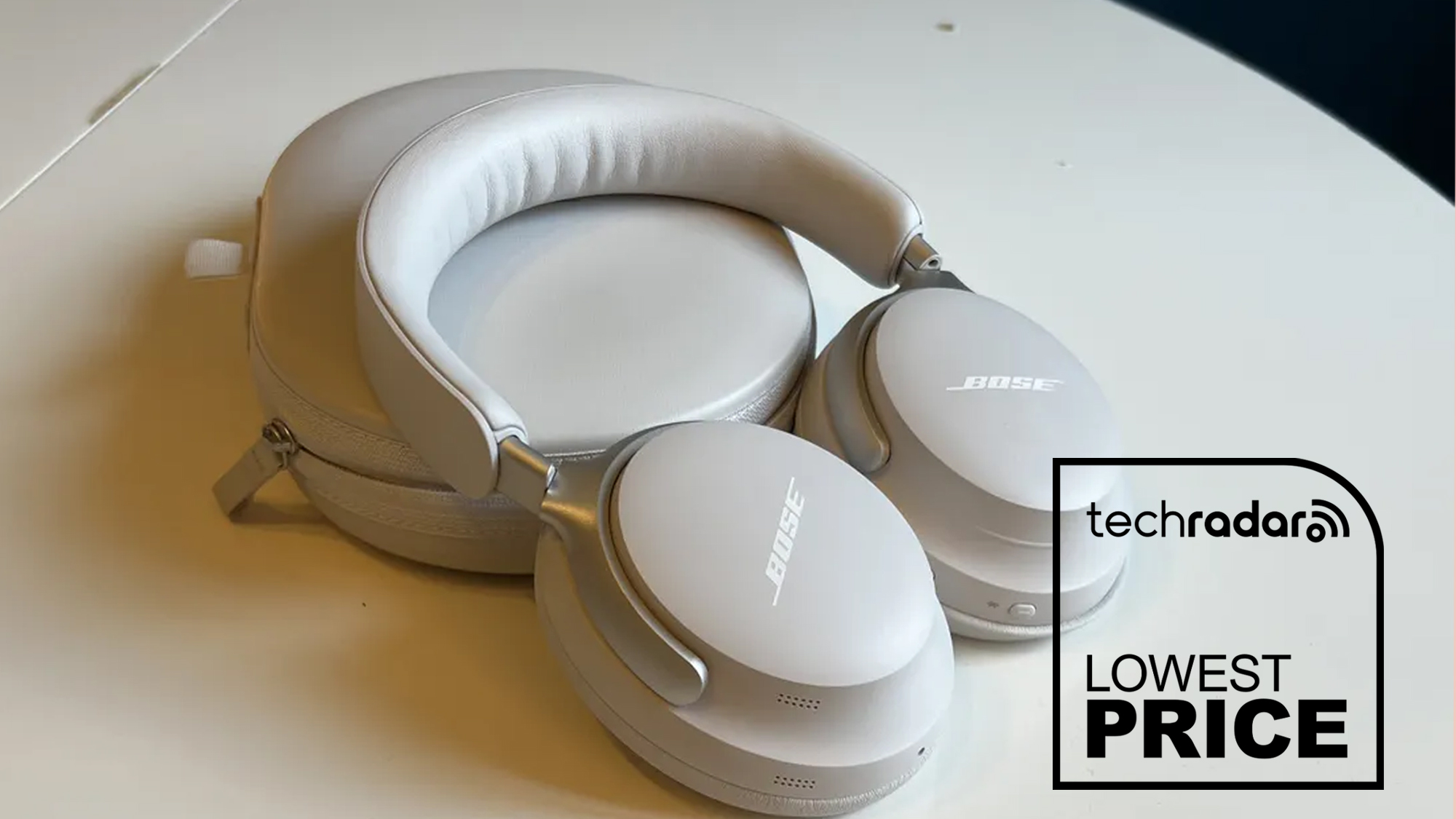 Bose QuietComfort Ultra headphones resting on their travel case