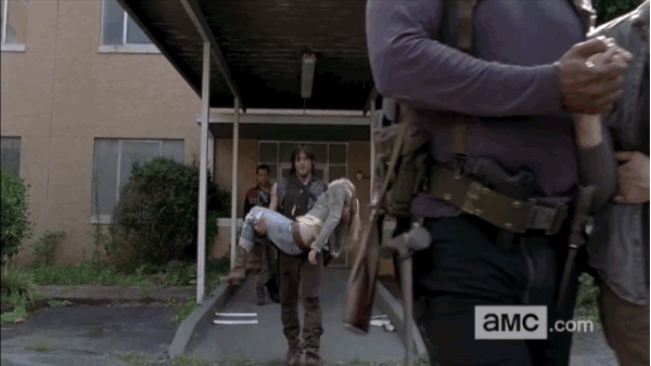 Daryl carrying beth