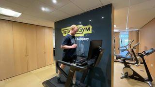 TechRadar fitness writer Harry Bullmore testing the Technogym Run treadmill