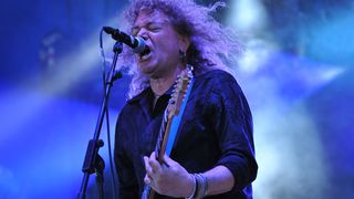 Dave Meniketti performs onstage