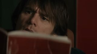 Jim Carrey reading in The Number 23