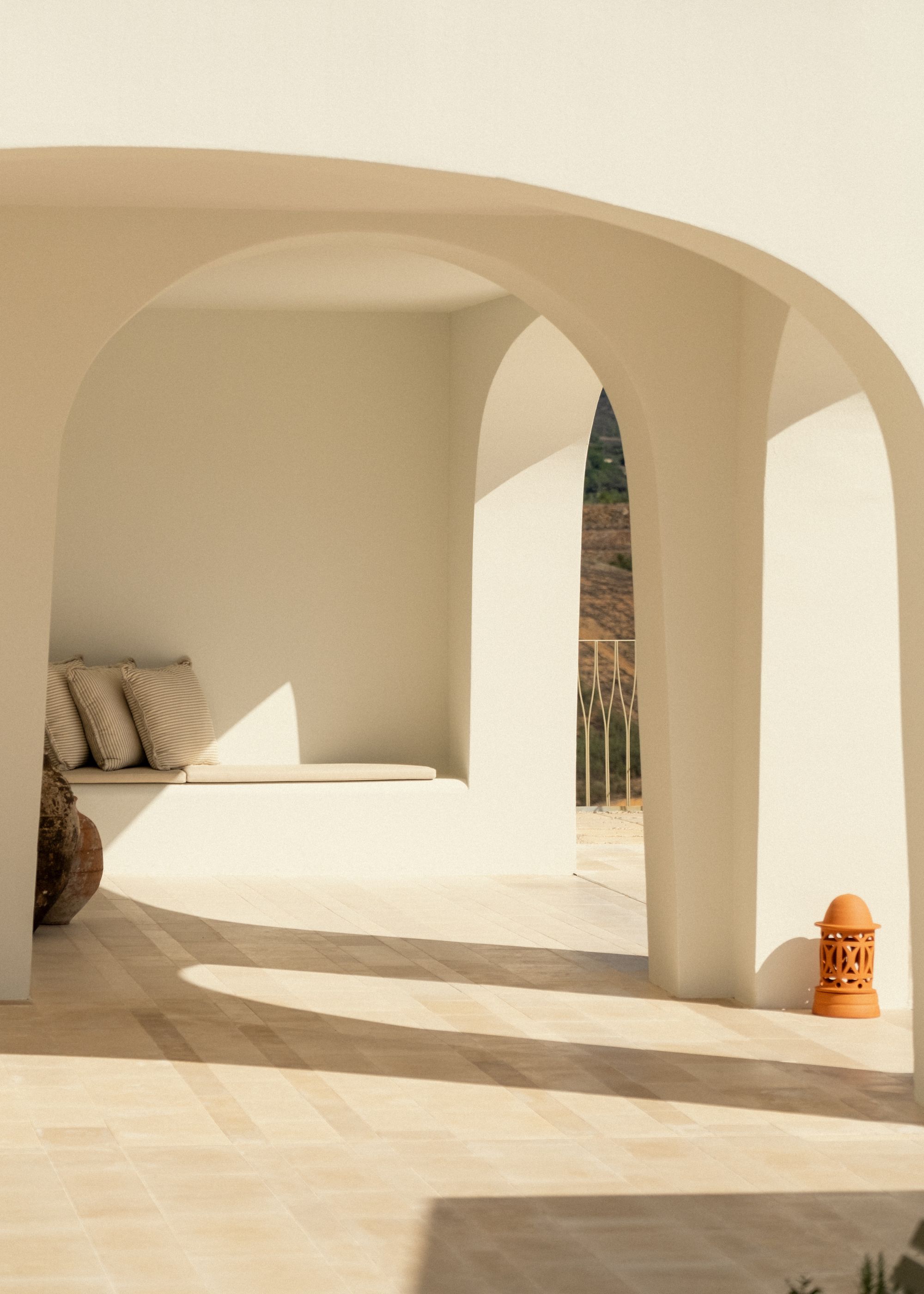 Sleek lines and arches in the outside area of the Viceroy hotel 
