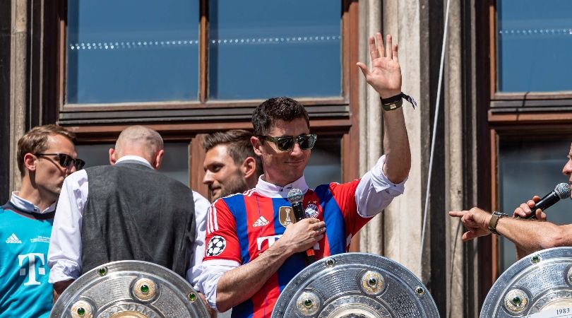 Robert Lewandowski gestures to fans during Bayern Munich&#039;s Bundesliga celebrations.