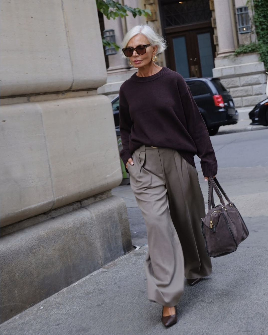 woman in trousers and sweater