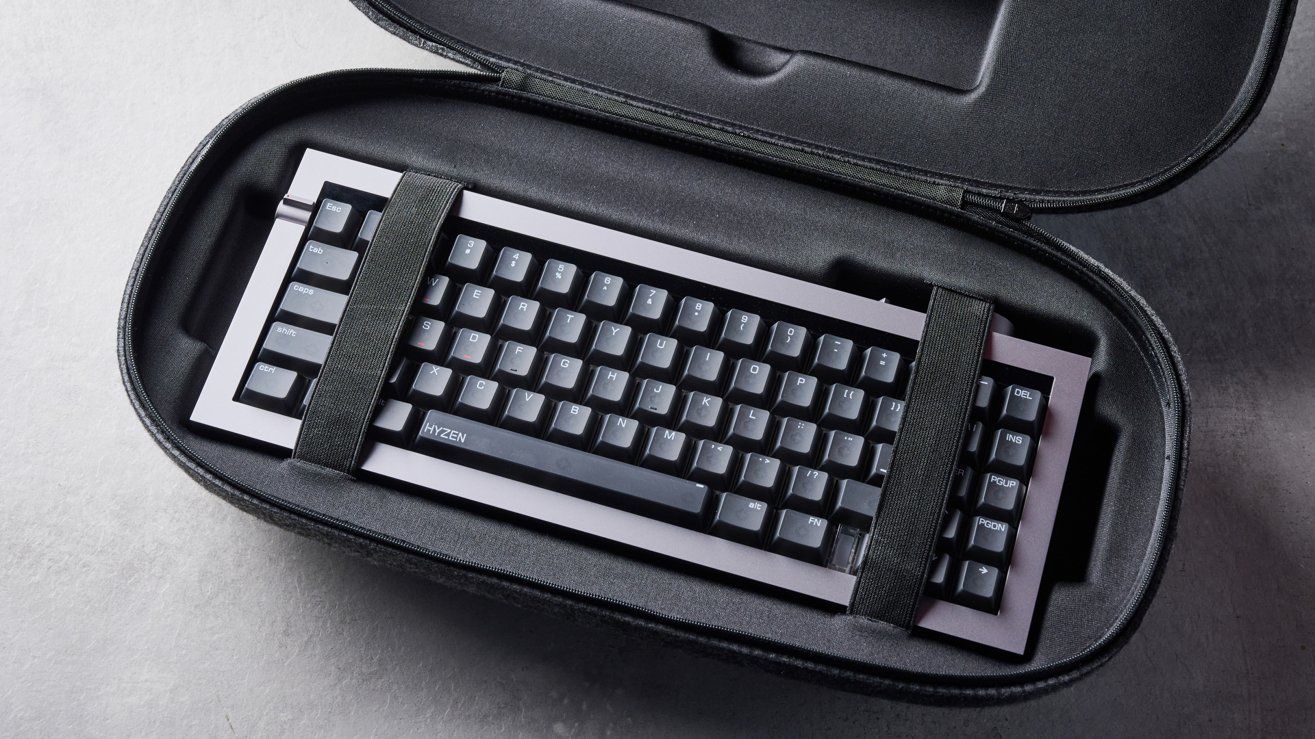 The Lofree Hyzen keyboard on a stone surface