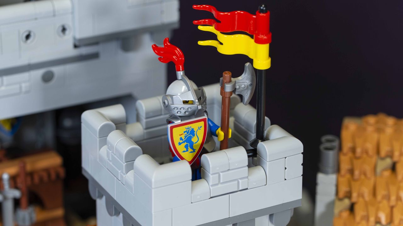 A knight stands guard atop a turret