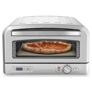 A Cuisinart Indoor Pizza Oven cooking a pizza on a white background