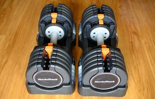 NordicTrack Select-a-Weight Adjustable Dumbbells in storage trays