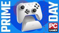 An image of an 8BitDo Ultimate 2 wireless controller against a colorful blue background, with Prime Day and a PC Gamer logo on the sides