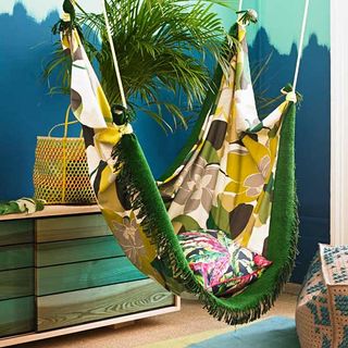 green hammock with plant pot