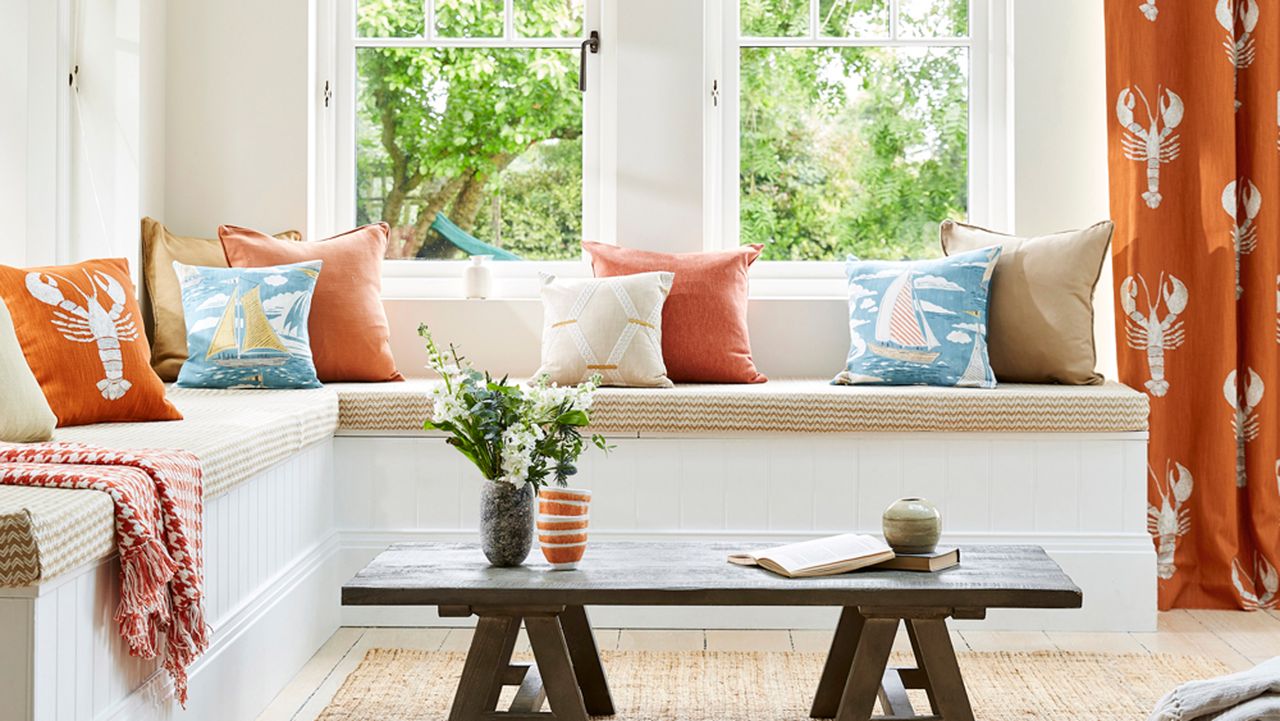 White living room with lobster cushions