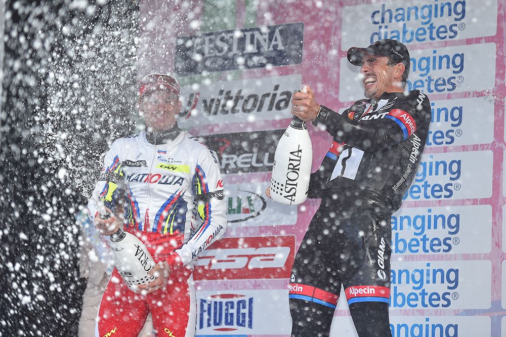 Degenkolb sprays champagne on the podium.