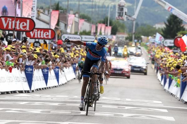 David Millar (Garmin-Sharp) outsprints Frenchman Jean-Christophe Peraud (AG2R La Mondiale) to win stage 12 of the Tour de France.
