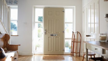 Front entryway with wooden bench