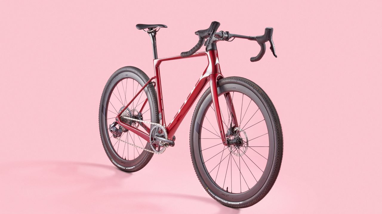 Vitus Venon Evo Force AXS gravel bike on a pink background