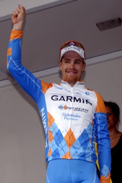 Tyler Farrar (Garmin-Slipstream) strides onto the podium in Tournai.