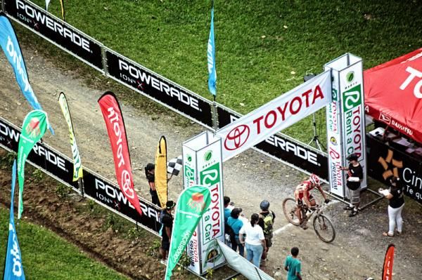 A rider zips across the line