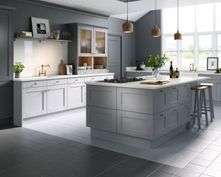 Two-tone kitchen layout with zoned areas and island