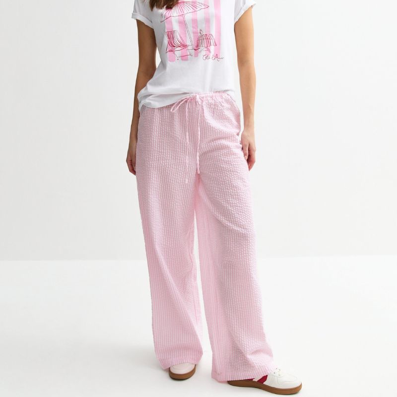 pink and white trousers
