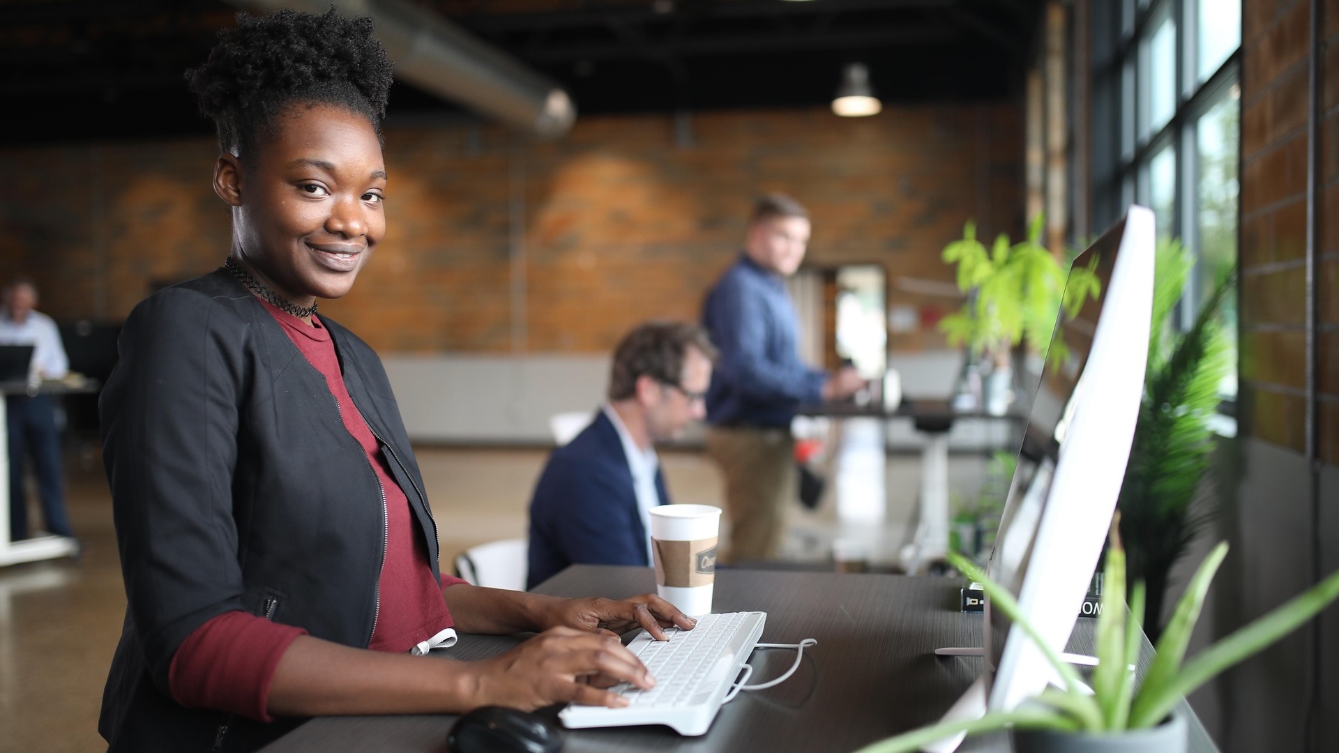 A person at a standing desk.