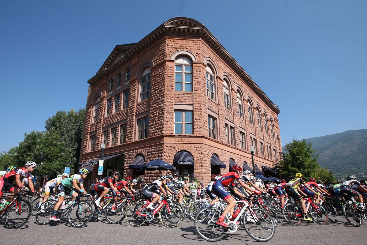 The riders take a corner in stunning Aspen