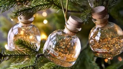 m&s snow globe gin baubles