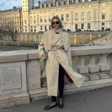 @annelauremais street style shot in paris wearing a trench and flats