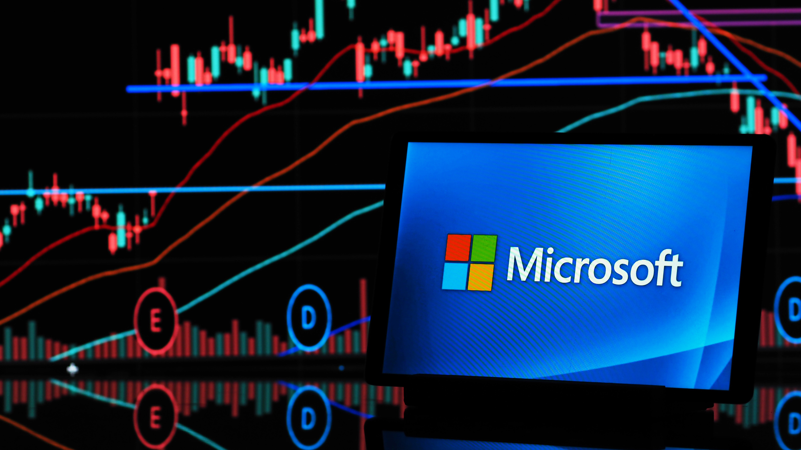 In this photo illustration, Microsoft Corporation logo is seen displayed on a monitor.