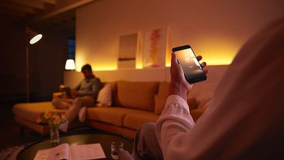 Philips Hue smart lights being controlled via the Philips Hue App