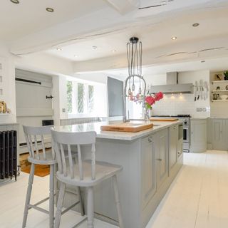 bourne eau house kitchen with contemporary marble worktops and sleek grey cabinetry
