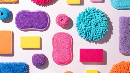A collection of colorful cleaning supplies