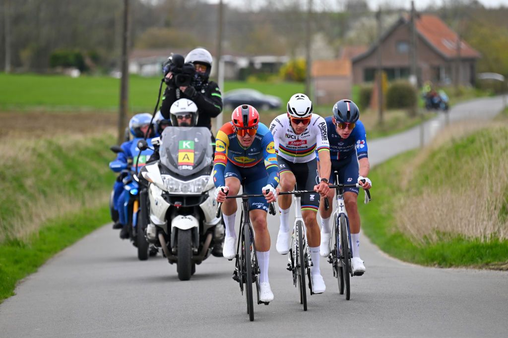WEVELGEM BELGIUM MARCH 24 LR Mads Pedersen of Denmark and Team Lidl Trek Mathieu van der Poel of The Netherlands and Team Alpecin Deceuninck and Laurence Pithie of New Zealand and Team Groupama FDJ compete in the breakaway during the 86th GentWevelgem in Flanders Fields 2024 Mens Elite a 2531km one day race from Ieper to Wevelgem UCIWT on March 24 2024 in Wevelgem Belgium Photo by Tim de WaeleGetty Images