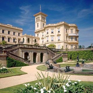 osborne house with plant and shrubs with cream wall