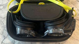 FORM Smart Swim 2 swimming goggles laid in the case