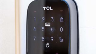 TCL D1 Pro lock attached to front door