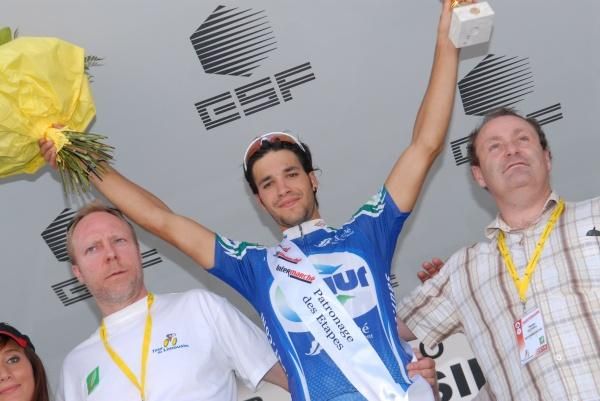 J&eacute;r&eacute;mie Galland (Saur - Sojasun) on the podium for winning the opening stage.