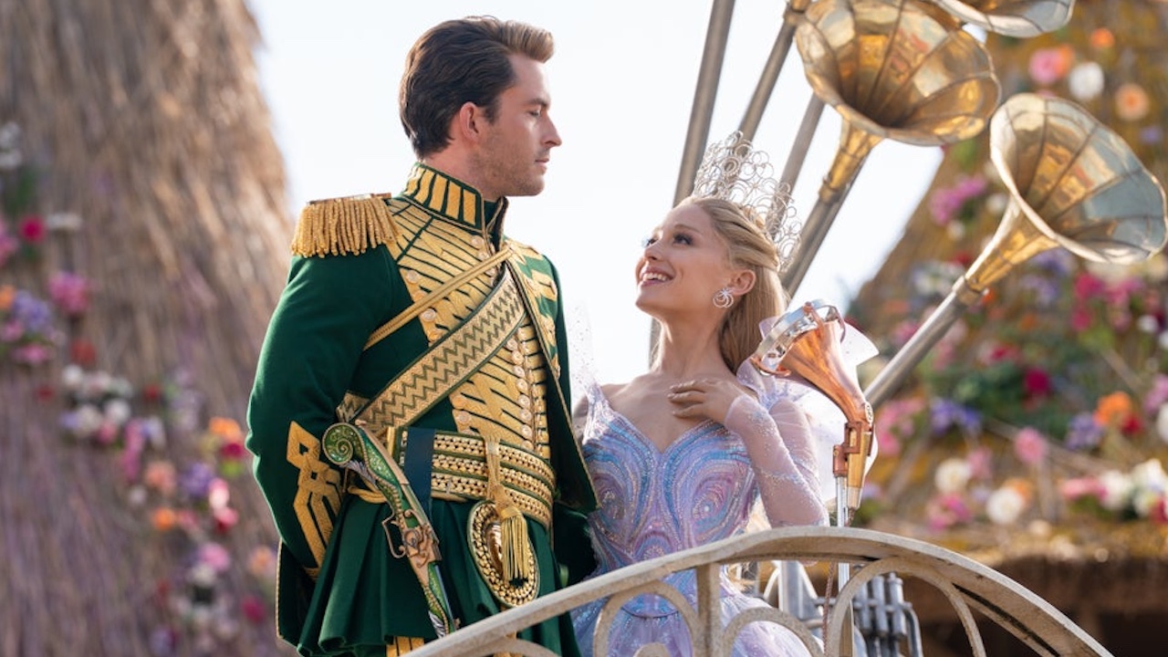 Jonathan Bailey and Ariana Grande as Fiyero and Glinda looking at each other and smiling in Wicked For Good &quot;Thank Goodness&quot; scene 