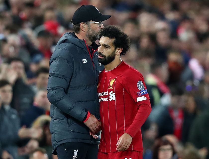 LIVERPOOL, ENGLAND - OCTOBER 02: Mohamed Salah of Liverpool embraces Jurgen Klopp, Manager of Liverpool after being substituted during the UEFA Champions League group E match between Liverpool FC and RB Salzburg at Anfield on October 02, 2019 in Liverpool, United Kingdom. (Photo by Clive Brunskill/Getty Images)