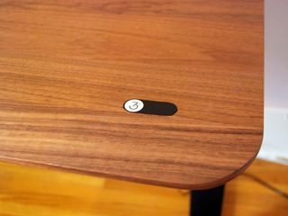 Gesture sensor that detects your hand above and below the desk to raise or lower.