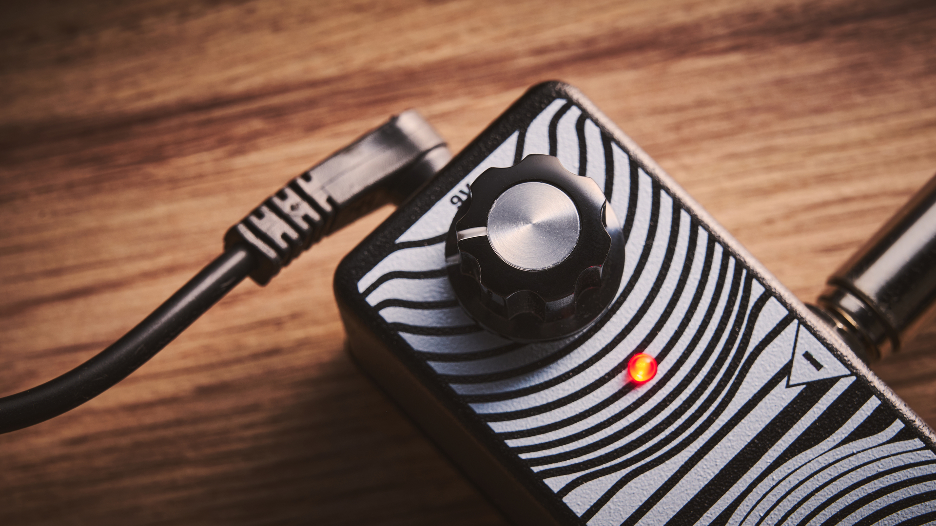 Close up of the volume knob on the Earthquaker Devices Easy Listening guitar headphone amp