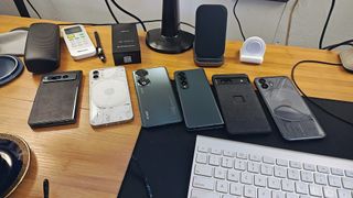 A bunch of phones on a desk