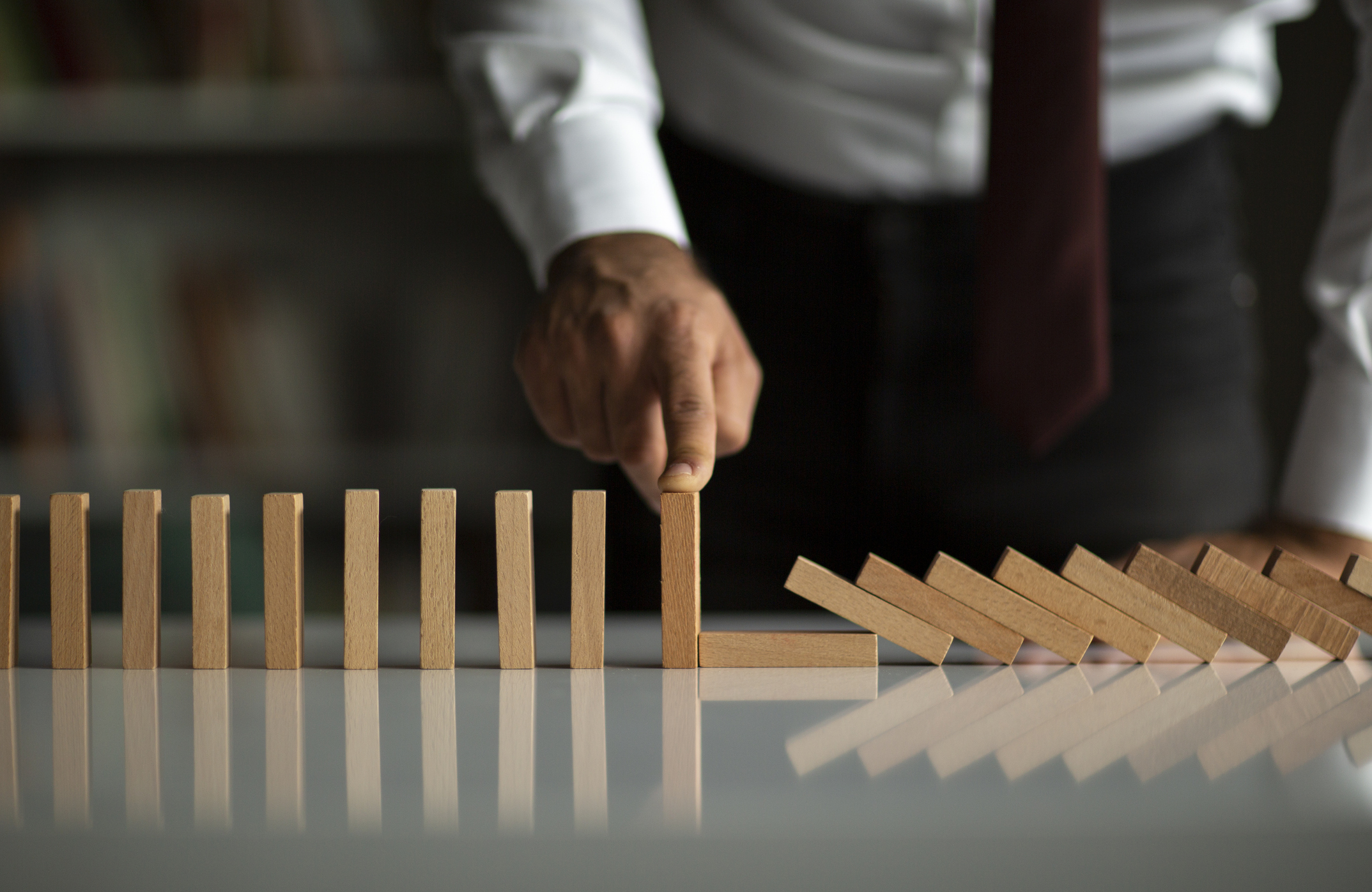 Stop Domino Effect. Risk Management and Insurance Concept