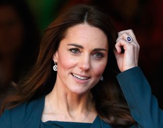 Catherine, Duchess of Cambridge attends the ICAP charity day at ICAP on December 9 wearing her engagement ring, which was recently part of Princess Diana's jewelry collection