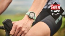 Female cyclist wearing a smartwatch