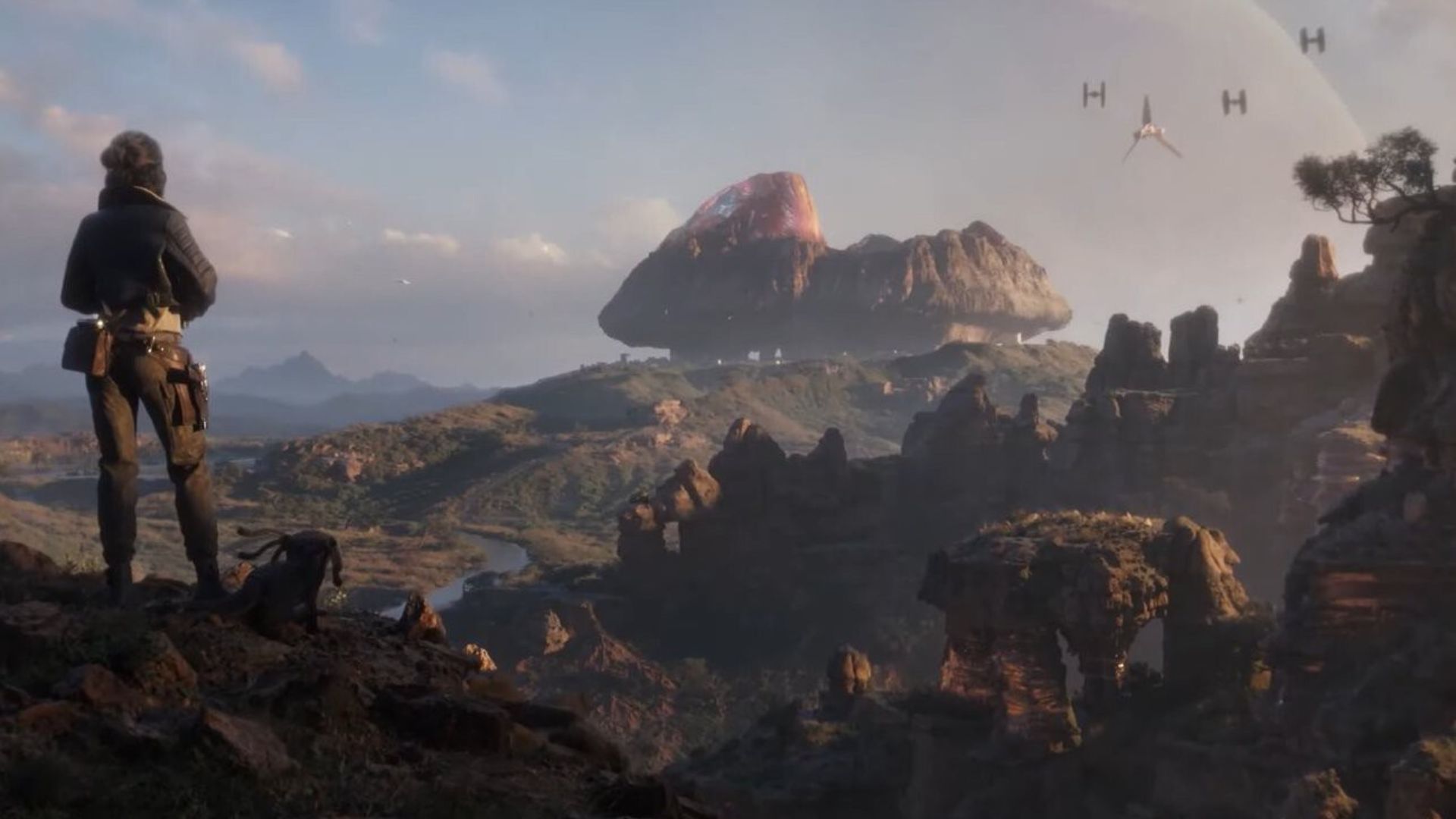 کی وس و نیکس روی تپه ای مشرف به محیطی جدید در Star Wars Outlaws ایستاده بودند.