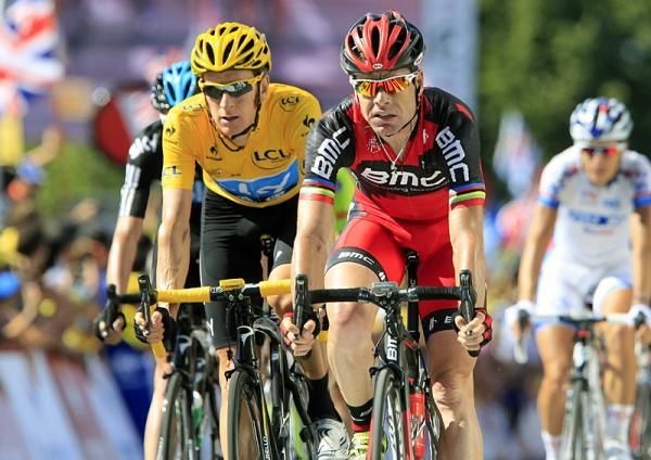 Tour de France leader Bradley Wiggins (Sky) and defending Tour champion Cadel Evans (BMC) cross the finish line in Pau.