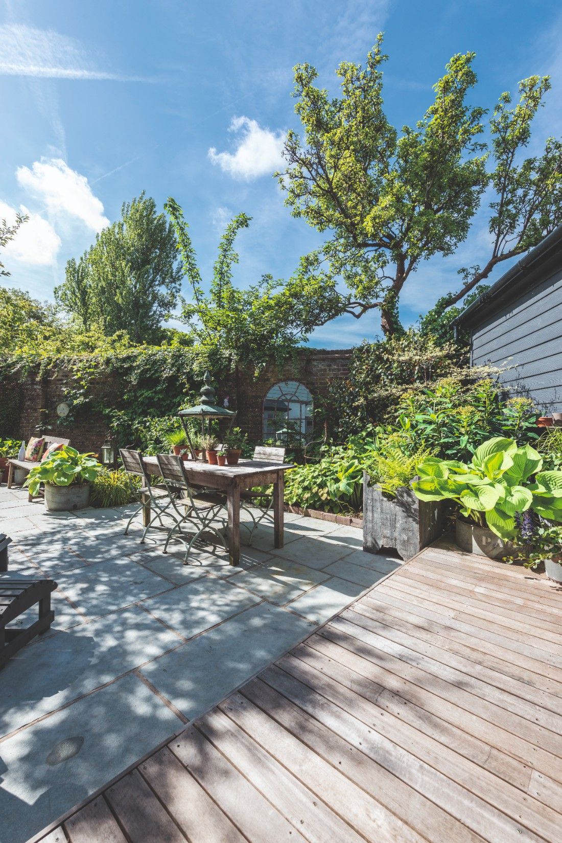 Bright decking area with outdoor dining set