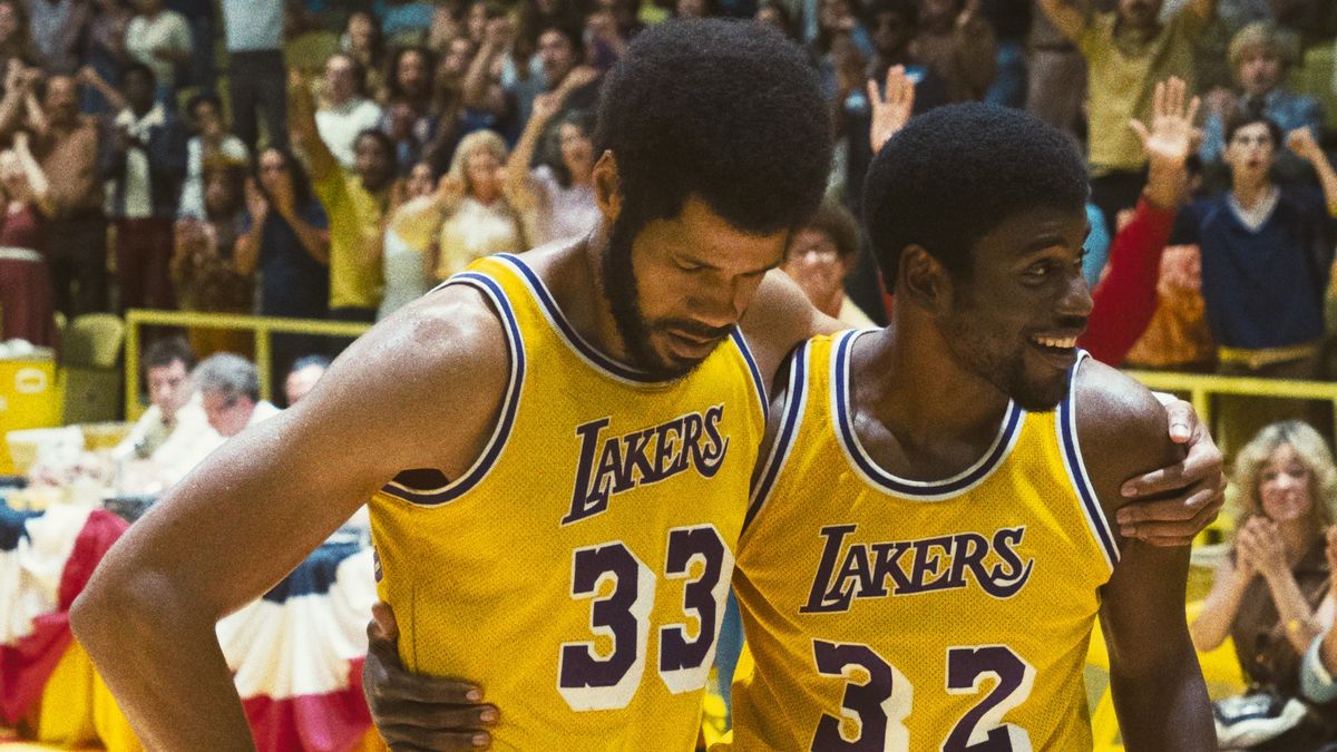 Solomon Hughes and Quincy Isaiah as Kareem Abdul-Jabbar and Magic Johnson walking off court in Winning Time