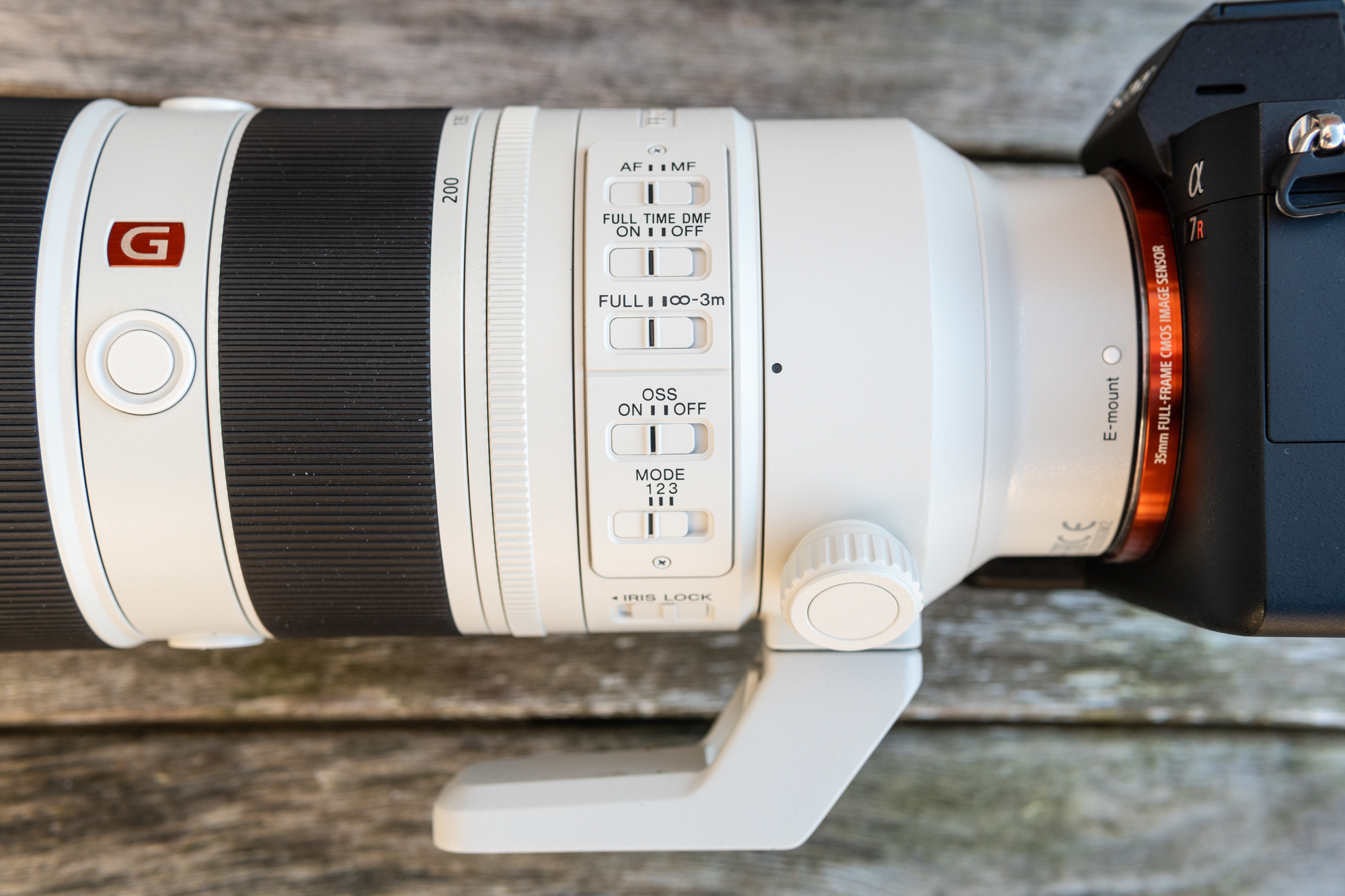 Sony lens close up revealing its controls that include optical stabilization