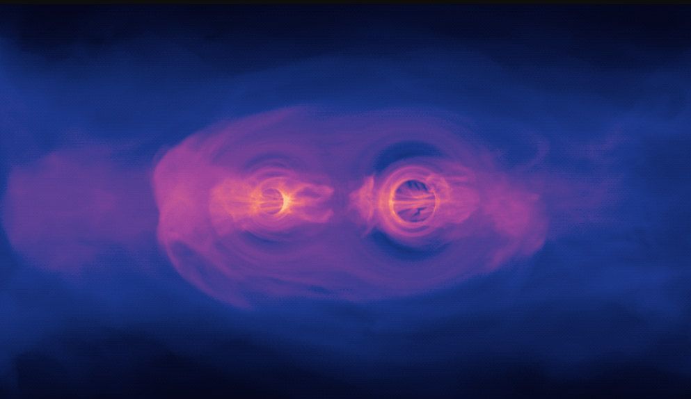 This still from a NASA simulation shows the glow from two supermassive black holes as they spiral toward each other ahead of a collision. 